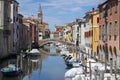 Chioggia, ITALY - June 10, 2022: Pictoresque streets of Chioggia town with water canal, boats and old buldings Royalty Free Stock Photo