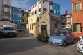 Chioggia, ITALY - June 4, 2022: Pictoresque streets of old town Sottomarina with small chapel, colorful buldings in sunny day