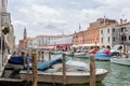 Chioggia town in venetian lagoon, water canal, church, typical architecture, boats. Veneto, Italy, Europe