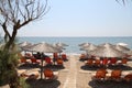 Chios Island, beach with sunbeds in Greece