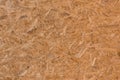 Chipboard brown osb surface pressed wooden pattern texture particleboard background construction material press board