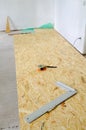 Chipboard floor installation Royalty Free Stock Photo