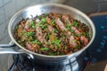 Chipolata sausages cooked with lentils, carrots and parsley