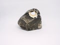 Chipped obsidian stone with cavity inside, sharp cracks flint