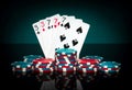 Chips and cards on black table. Playing cards in poker game with full house or full boat combination. Successful and win in casino Royalty Free Stock Photo