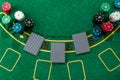 Chips cards lie on a green blackjack table top view. Casino concept, gambling Royalty Free Stock Photo