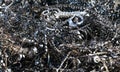 Chips and curls of ferrous metal into landfill for recycling 3 Royalty Free Stock Photo