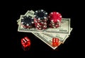 Chips with dollars and dice on a black background. Winning after the maximum combination of twelve