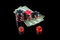 Chips with dollars and dice on a black background. Winning after the maximum combination of twelve