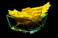 chips in glass form on a black background, isolate Royalty Free Stock Photo