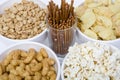 Chips peanuts popcorn salted sticks Royalty Free Stock Photo