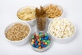 Chips peanuts popcorn salted sticks Royalty Free Stock Photo