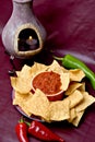 Chips, salsa and peppers Royalty Free Stock Photo