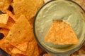 Chips and snacks with avocado and dip sauce, close-up top view Royalty Free Stock Photo