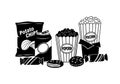 Chips, a soda can, two containers of popcorn labeled Popcorn Royalty Free Stock Photo