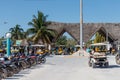 Puerto de Holbox with boats ferry village port harbor arriving people taxi in Quintana Roo Mexico.