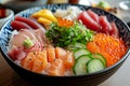 Chirashi Bowl: A colorful bowl of vinegared rice topped with a variety of sashimi, vegetables, and garnishes. Royalty Free Stock Photo