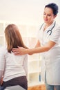 Chiropractor doing adjustment on female patient Royalty Free Stock Photo