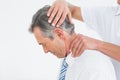 Chiropractor doing neck adjustment Royalty Free Stock Photo