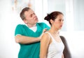 Chiropractor massage the female patient spine and back Royalty Free Stock Photo