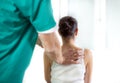 Chiropractor massage the female patient spine and back Royalty Free Stock Photo