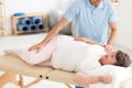 Chiropractor performing back adjustment Royalty Free Stock Photo