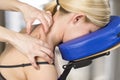 Chiropractor, physiotherapist giving a back massage to a woman p Royalty Free Stock Photo