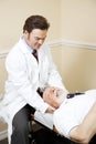 Chiropractor Relieves Neck Pain Royalty Free Stock Photo