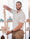 Chiropractor, spine of skeleton and portrait of doctor for healthcare, medical and orthopedic anatomy. Physiotherapy