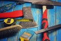 Chisel, hammer, ax, brush, tape measure, brush