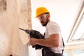 Chiseling of a concrete wall Royalty Free Stock Photo