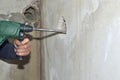 Chiseling a Hole in a Wall Royalty Free Stock Photo