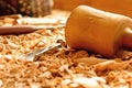 Chisels laid in wooden shavings on the desk Royalty Free Stock Photo