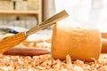 Chisels laid in wooden shavings on the desk Royalty Free Stock Photo