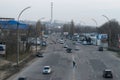 CHISINAU, MOLDOVA - 3 JANUARY, 2017: A man, trying to cross the street irregular in a quiet busy traffic area