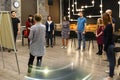 Chisinau, Republic of Moldova - April 30, 2018: Teacher of acting or business coach stands back in front of a group of students