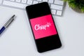 Chispa app logo on a smartphone screen. Royalty Free Stock Photo