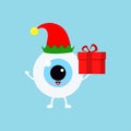 Chistmas eye ball with gift in elf costume with red hat icon isolated on background.