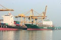 At Chittagong port, cargo ships stand on the Karnaphuli river