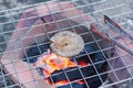 Chitterlings is roasted on the grill with stove.