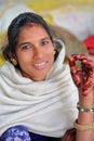 CHITTORGARH, RAJASTHAN, INDIA - DECEMBER 13, 2017: Portrait of a beautiful young woman at the vegetable market