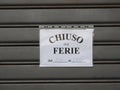 Chiuso per ferie translation: closed for holidays sign Royalty Free Stock Photo