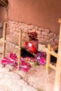 CHIVAY, AREQUPA, PERU - CIRCA 2013:An unidentified woman sell hand crafts in outdoors circa 2013 in Chivay, Peru