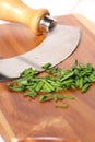 Chives chopped on wooden chopping board B Royalty Free Stock Photo