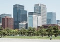 Chiyoda, Tokyo, Japan - Skyline of Marunouchi district viewd from Imperial Palace gardens. Royalty Free Stock Photo