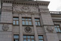 Chkalovsk, Russia, July 7, 2023. Fragment of the facade of the house of culture with bas-reliefs of the Soviet era.