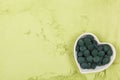 Chlorella and spirulina background. Royalty Free Stock Photo