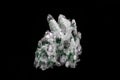 Chlorinated Quartz Crystals. Large crystals green and white; surrounded by clusters of smaller crystals. Royalty Free Stock Photo