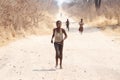 CHOBE, BOTSWANA - OCTOBER 5 2013: Poor African children wander t Royalty Free Stock Photo