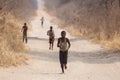 CHOBE, BOTSWANA - OCTOBER 5 2013: Poor African children wander t Royalty Free Stock Photo
